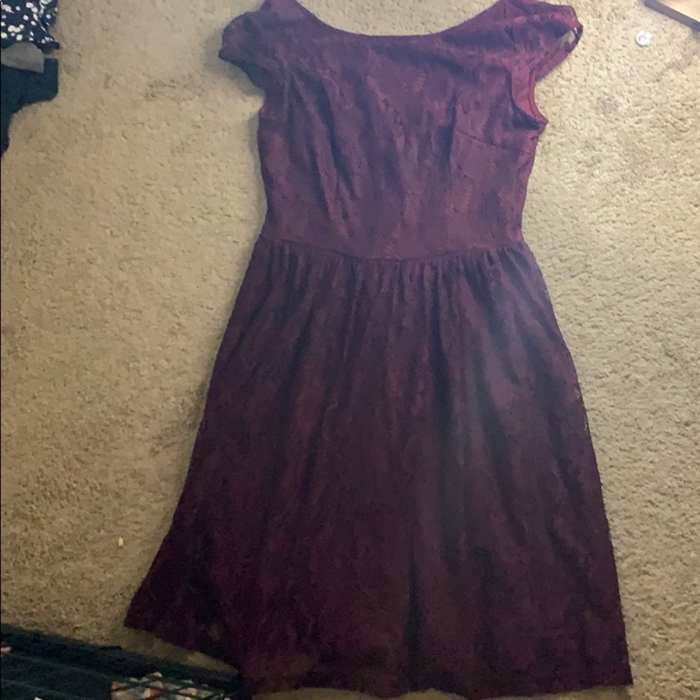 This dress is a lace red wine color